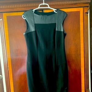 Sexy body hugging dress with leather detail